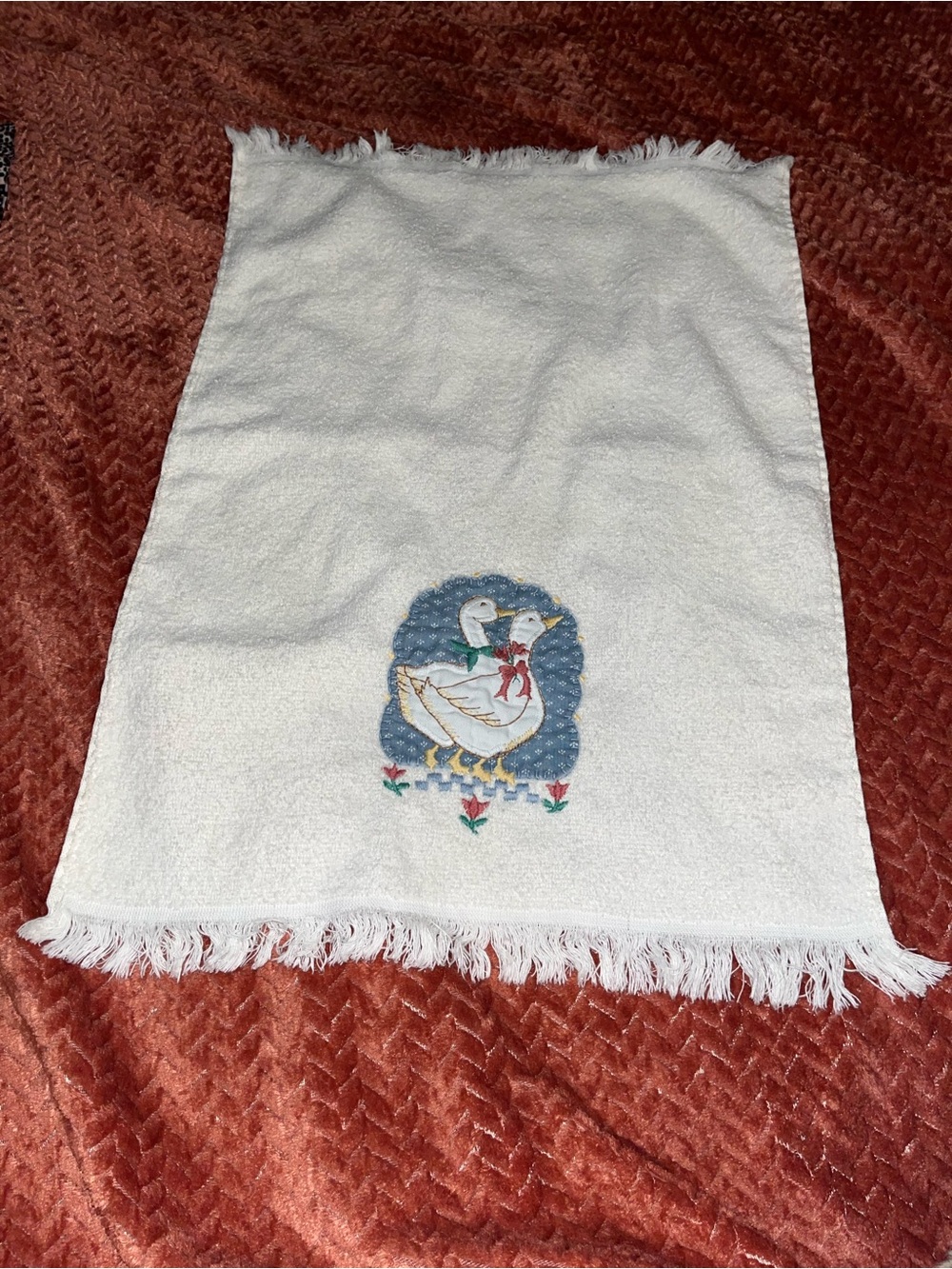 Vintage white Cannon kitchen towel  embroidered goose with festive red bows.